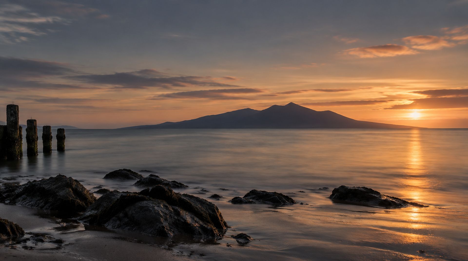 Evening light over the Firth of Clyde from Ayr, the Isle of Arran on the horizon